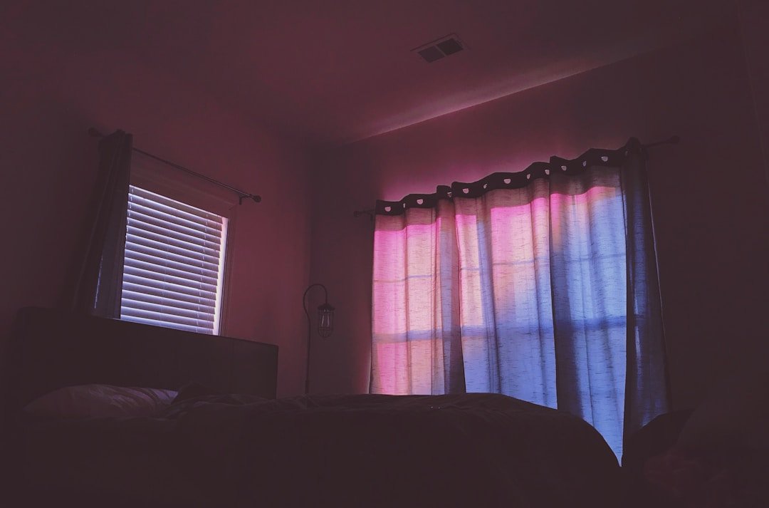 Sunset aesthetic bedroom with warm gradient lighting and decor