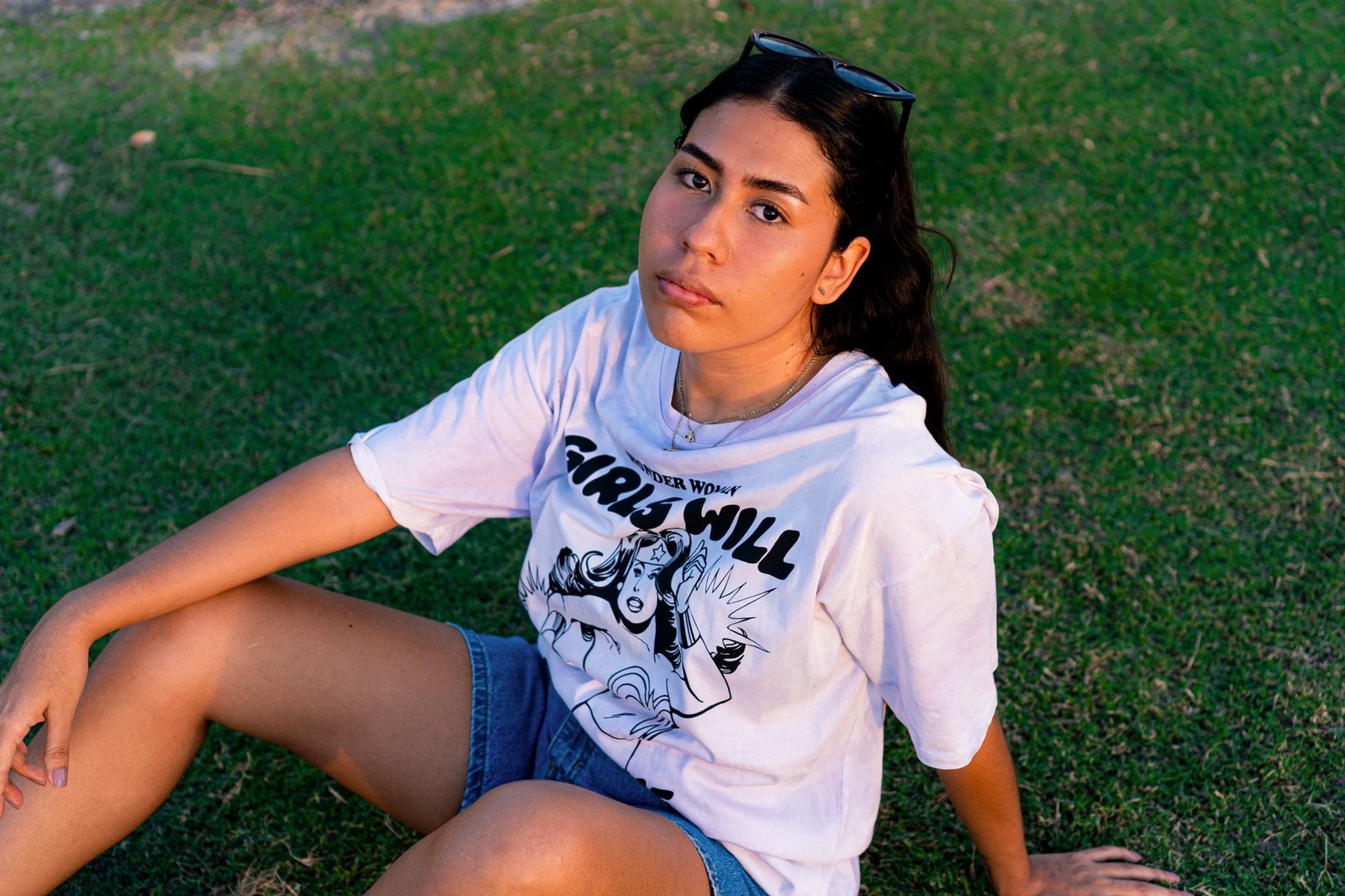 90s skate fashion with cargo shorts and graphic tee
