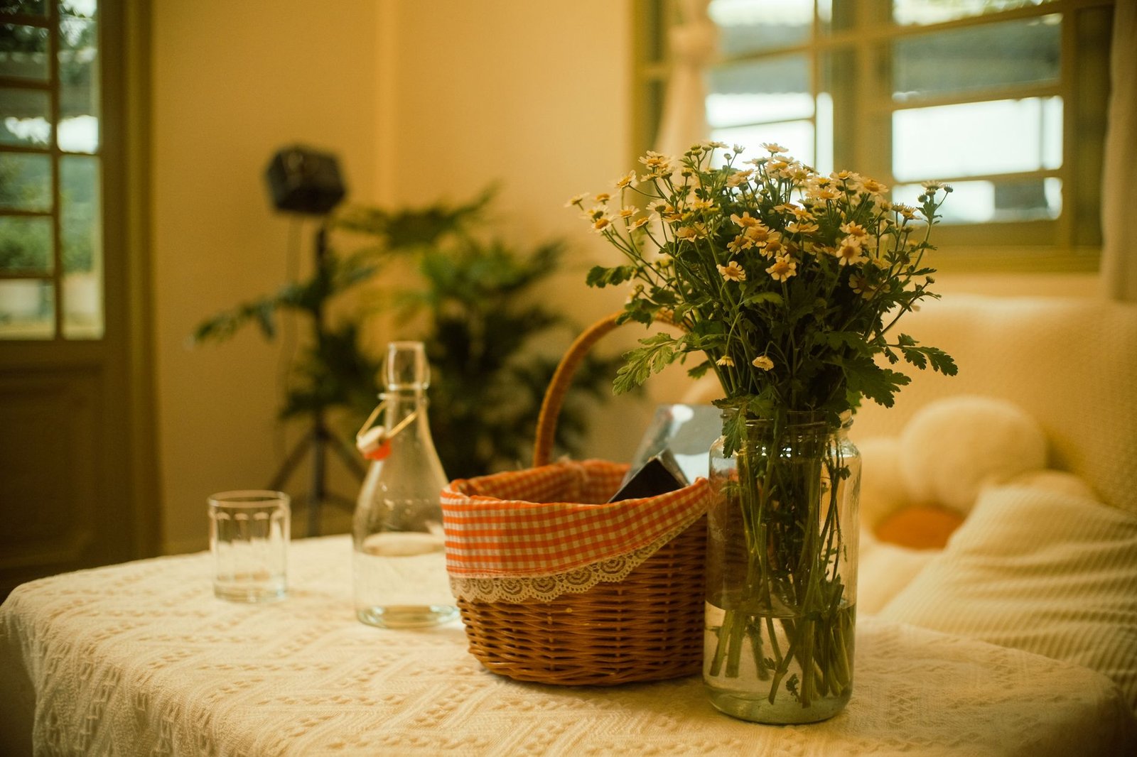 Cottagecore room decor with botanical plants and linen textiles
