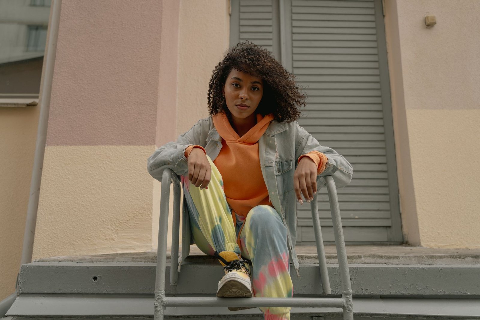 Gradient hoodie paired with clean neutral bottoms