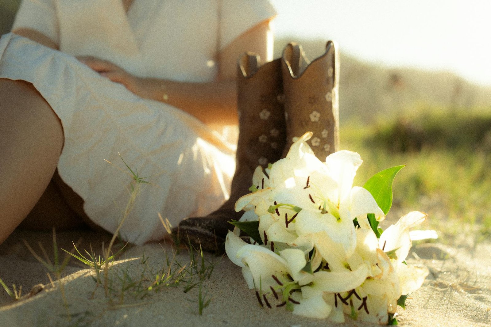 Coastal cowgirl floral maxi dress cowboy boots summer