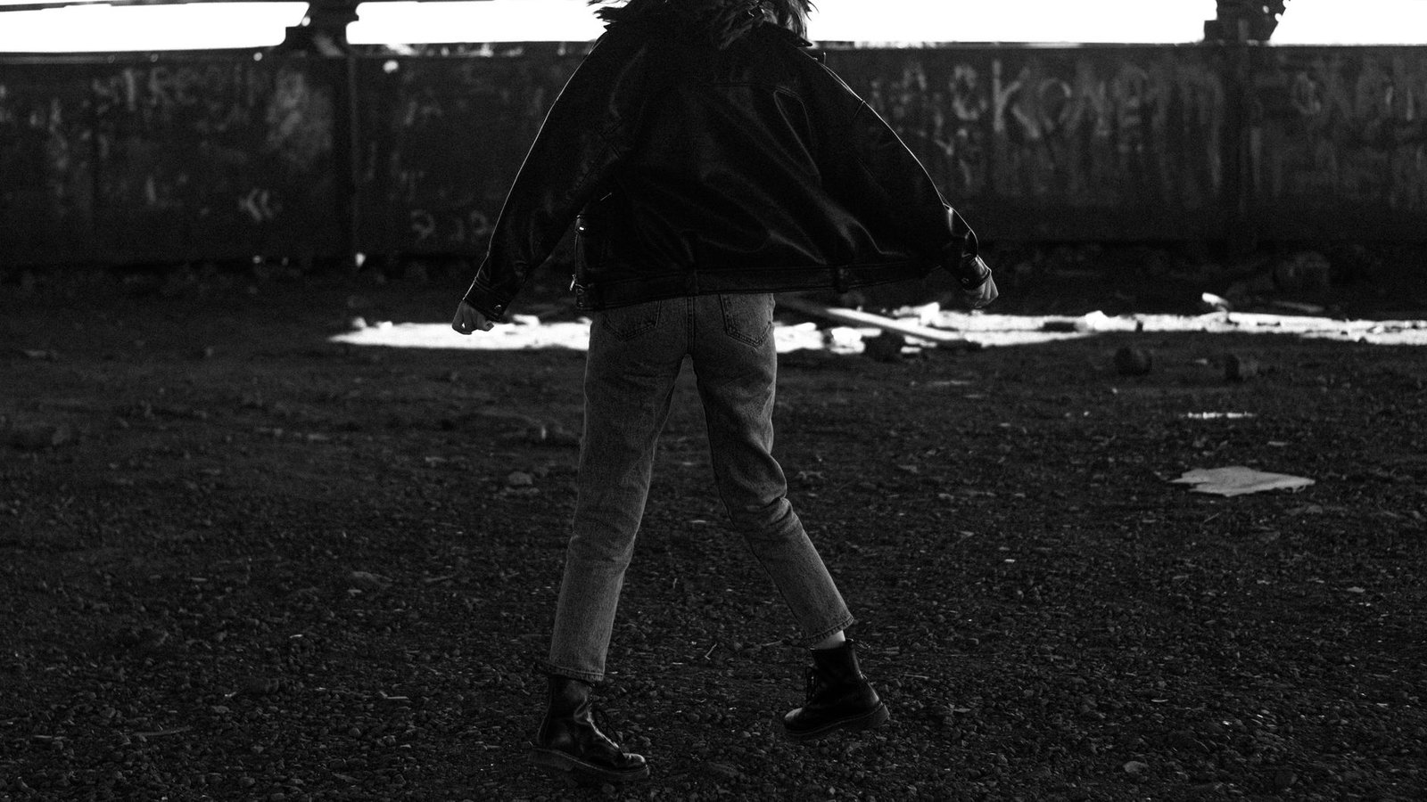 Downtown girl leather jacket vintage jeans ankle boots urban