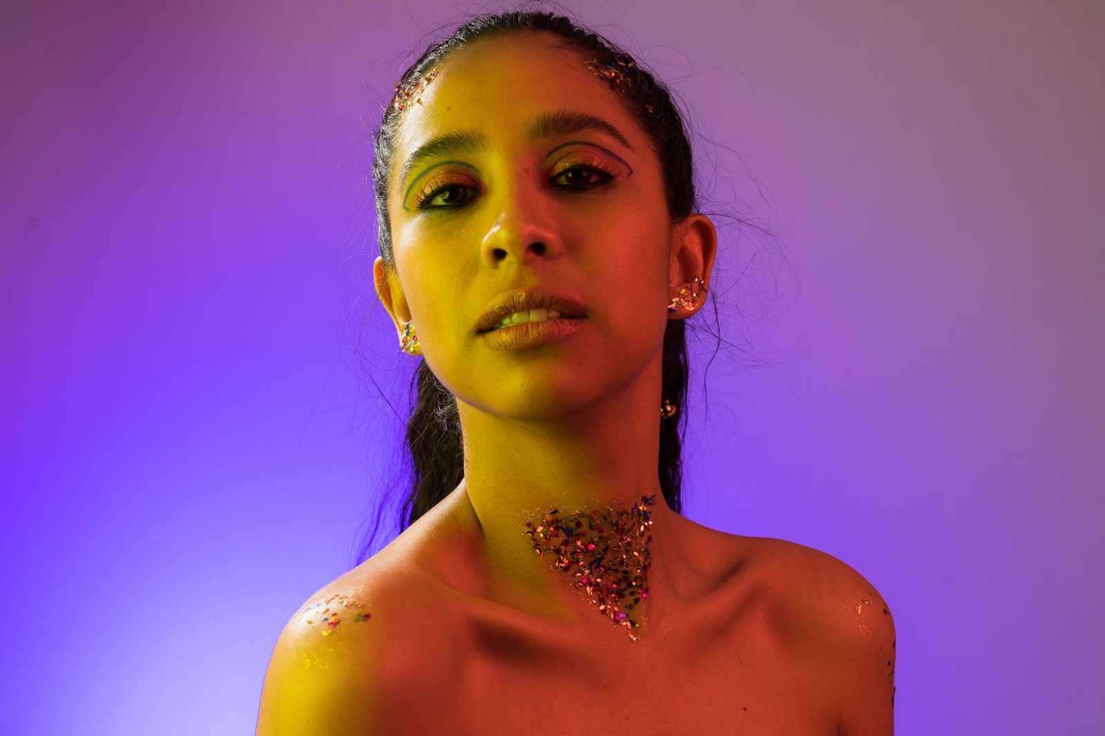 Jewel-tone gradient eye makeup editorial look