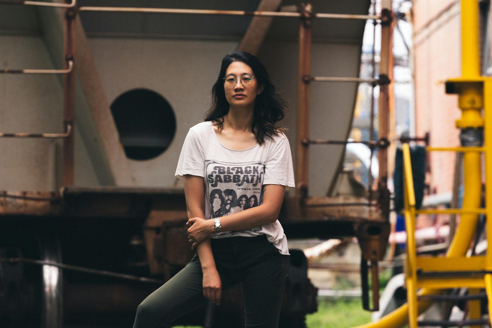 Grunge aesthetic with open flannel over band tee