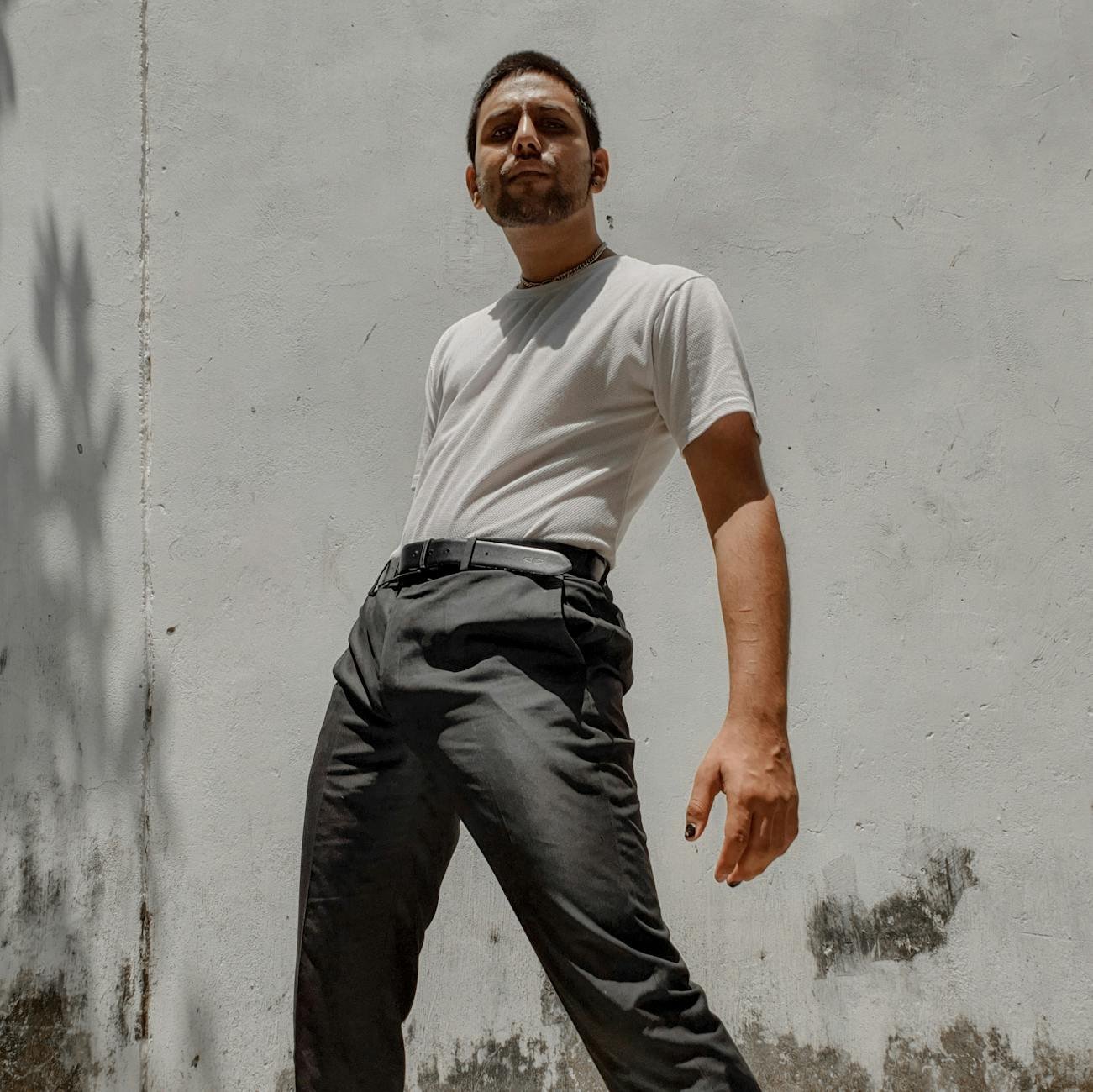 Gradient t-shirt tucked into tailored trousers for smart casual look