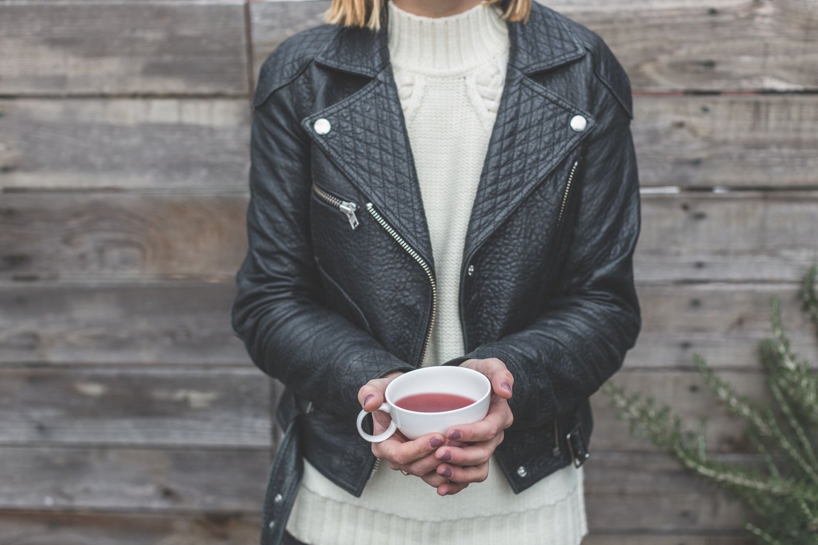 Leather jacket over knit jumper autumn casual fashion