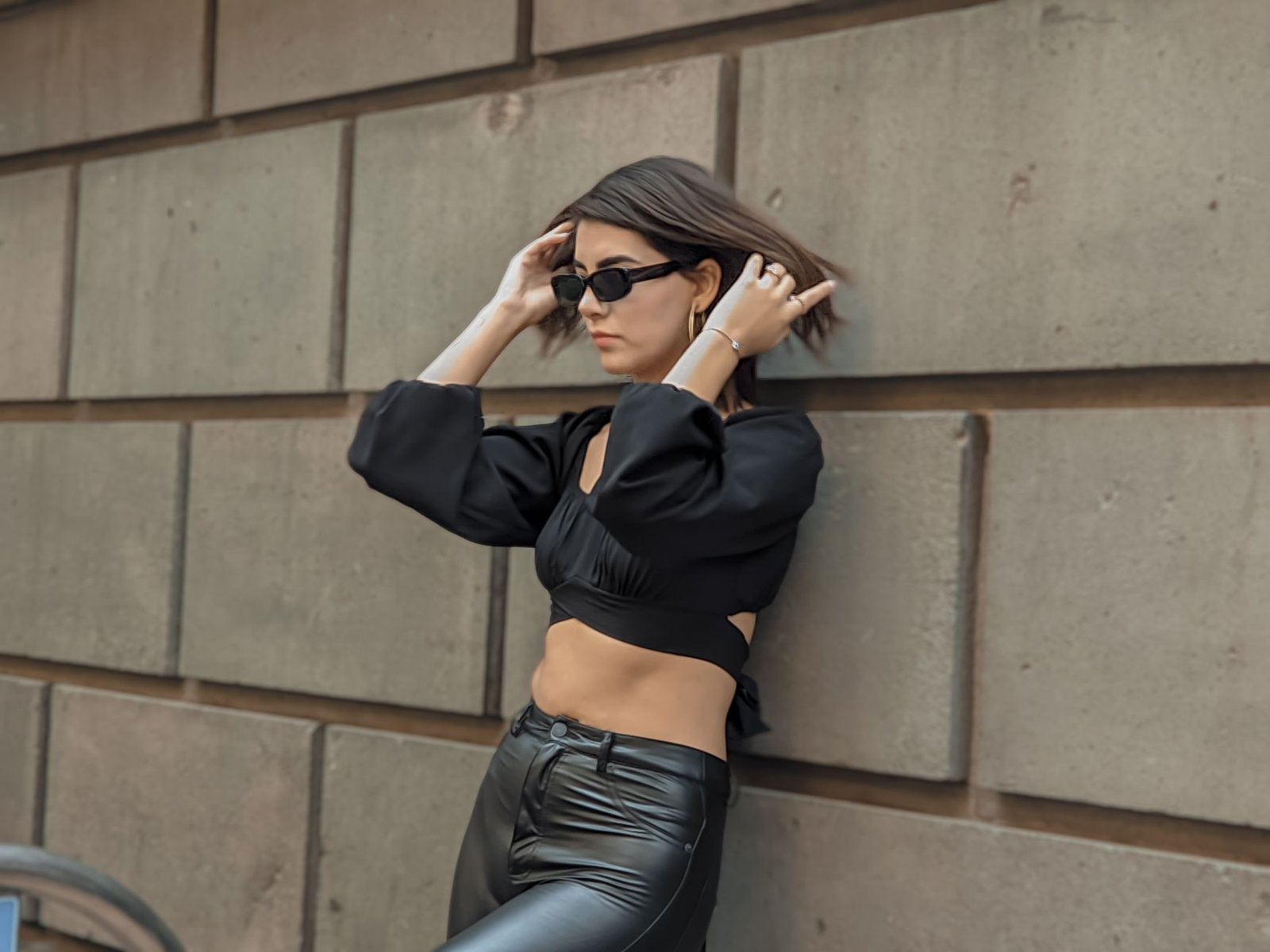 Leather pants evening look with satin camisole