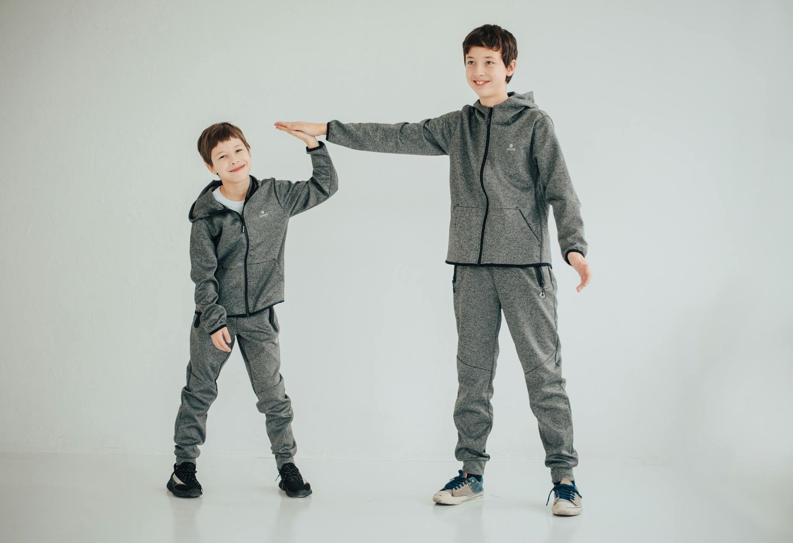 Matching tracksuit set styled with clean sneakers