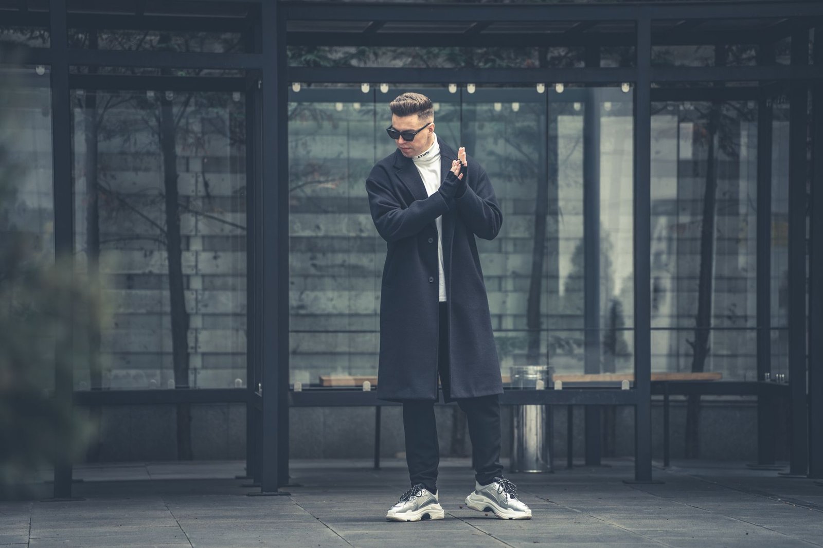 Luxury streetwear outfit combining high fashion and street culture