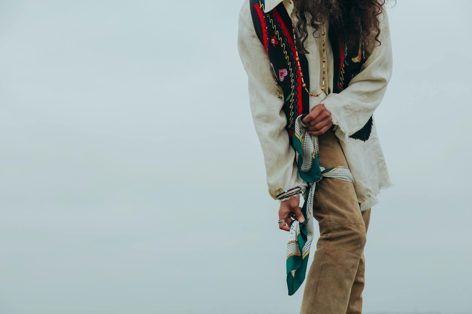Jewel tones layered maximalist fashion look