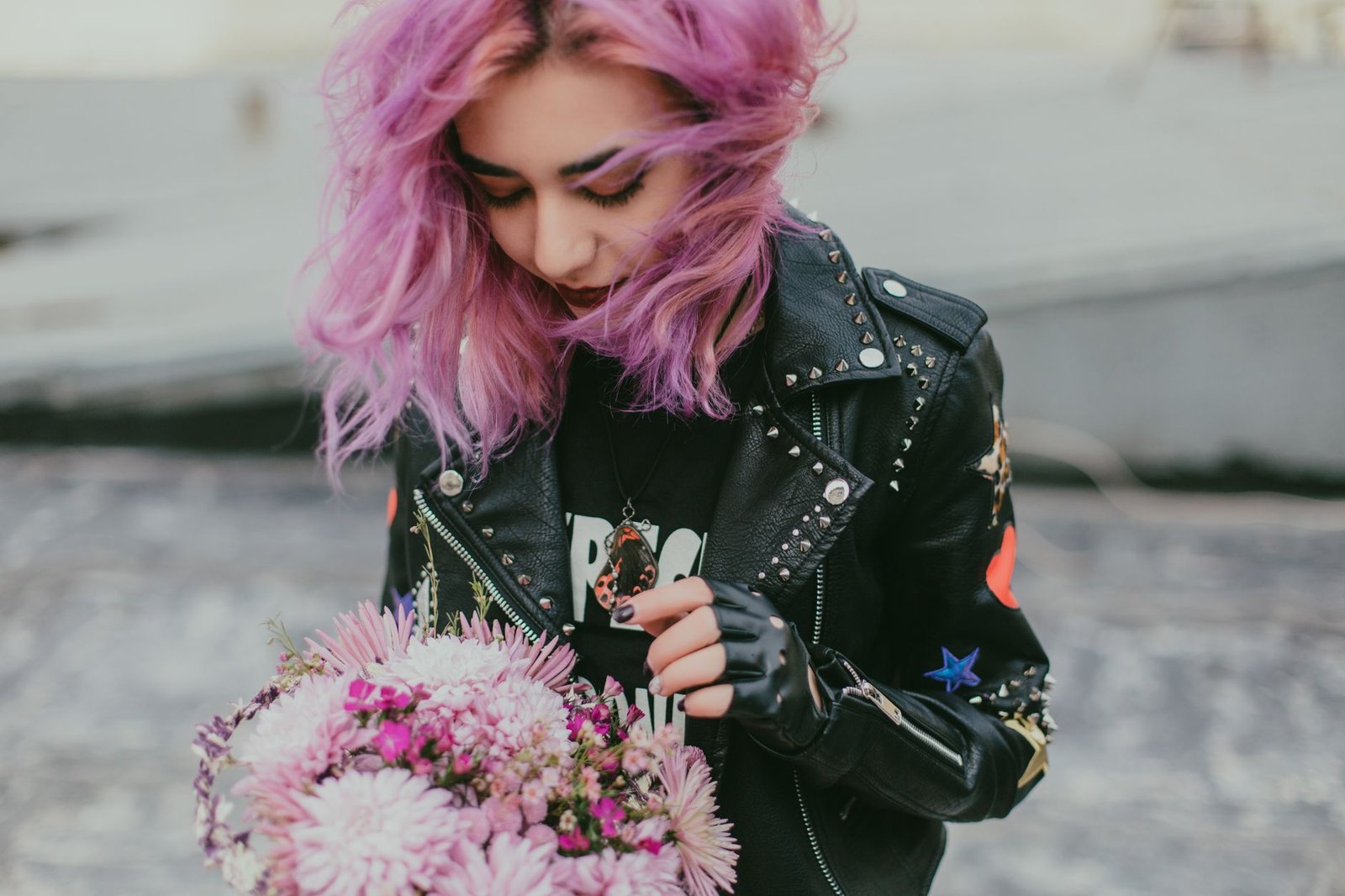 Punk aesthetic leather jacket and band tee