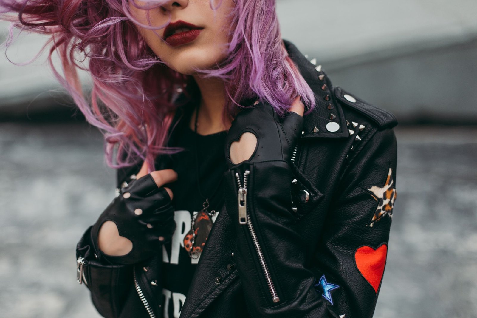 Punk fashion DIY patches and studs on jacket