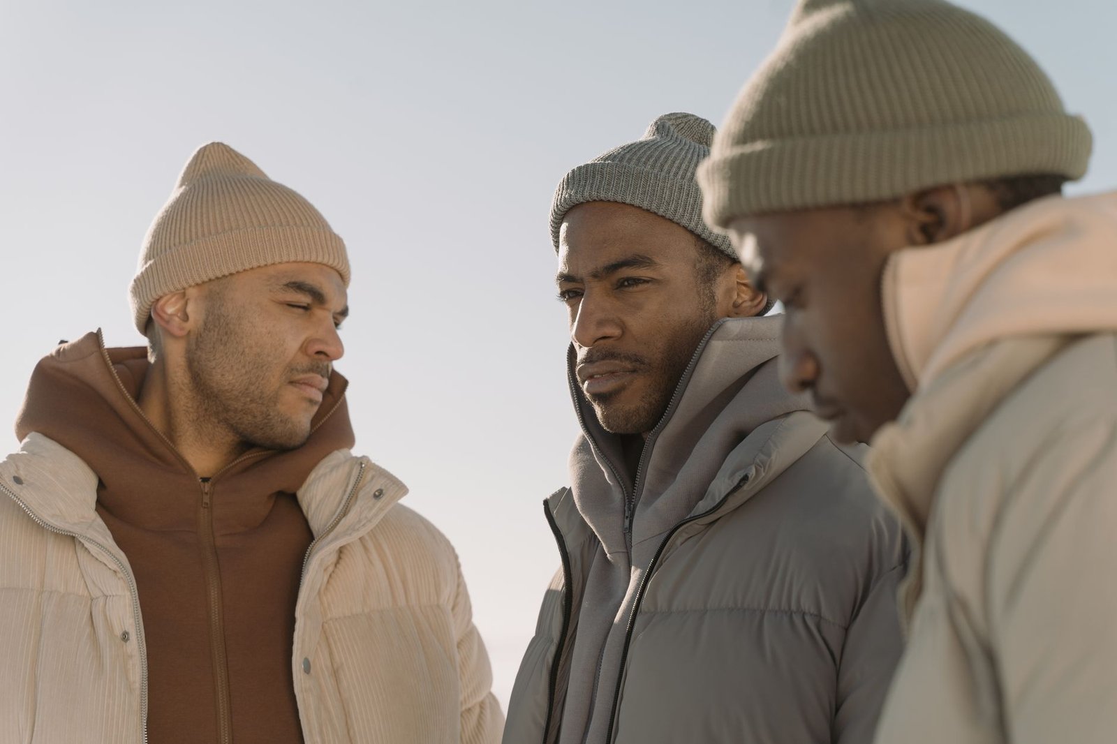 Knit beanie worn with layered streetwear outfit