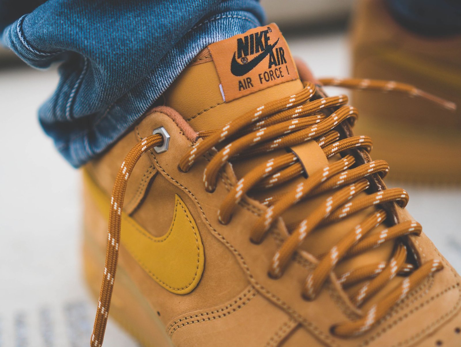 Nike Air Force 1 sneakers styled with streetwear outfit