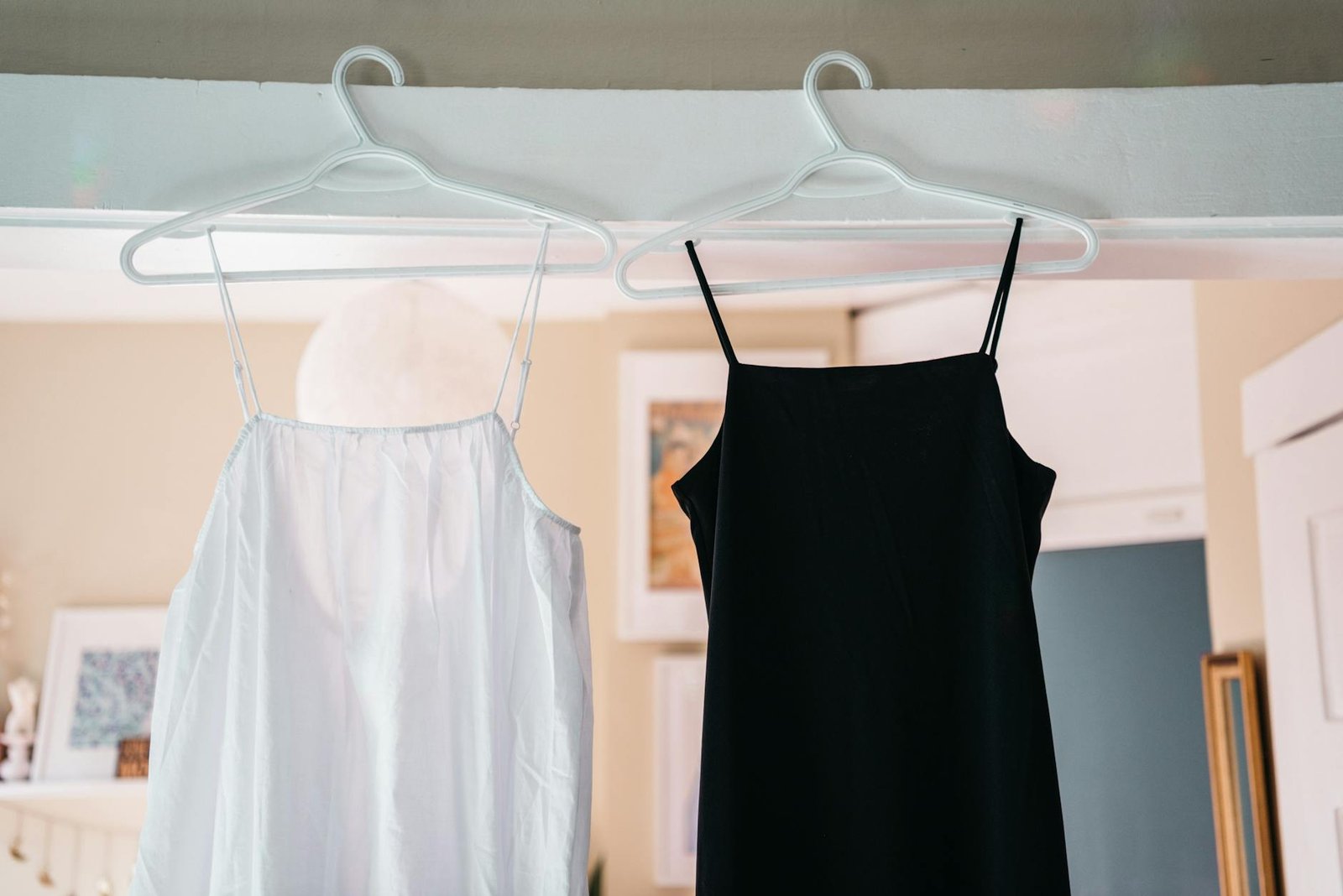 Organised wardrobe minimal fashion women neutral classic pieces